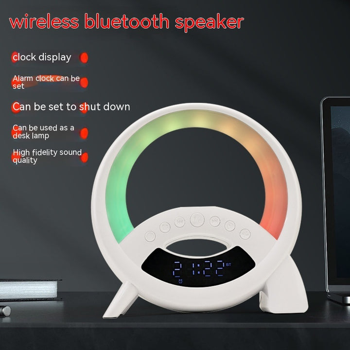 Wireless Bluetooth speaker with clock display and RGB lighting on a dark background