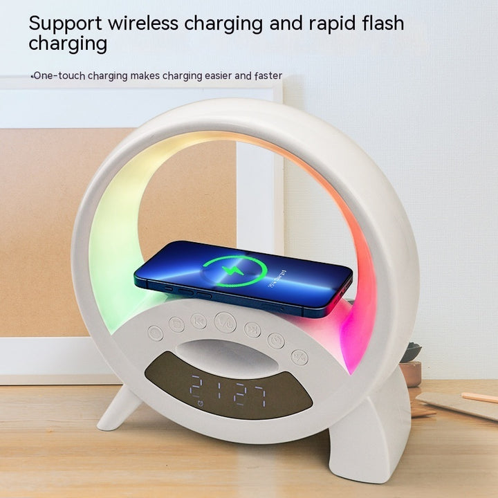 White charging station with digital clock displaying time and date, featuring wireless and rapid flash charging capabilities.